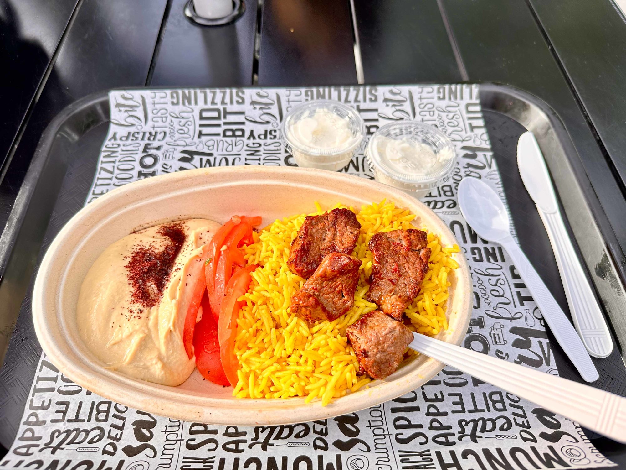 platter with chicken and yellow rice